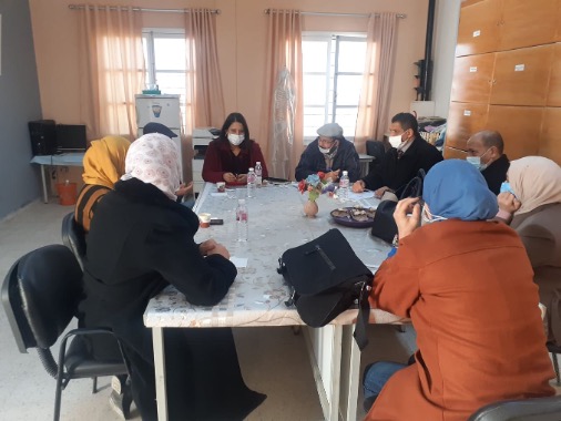 Meeting with school committee at 18 Janvier school